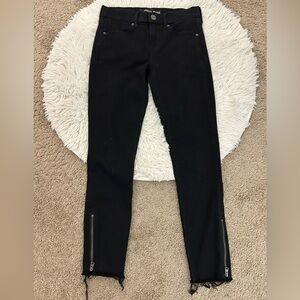 EXPRESS Zipper bottom distressed hem skinny